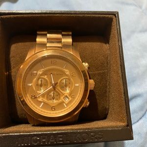 Rose gold Michael Kors watch. Never worn.